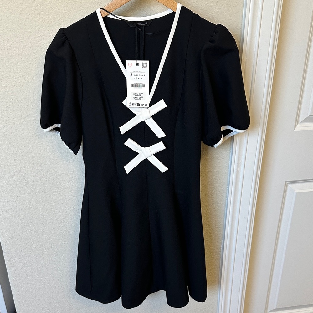 Women’s Black Puff Sleeve Top with White Trim